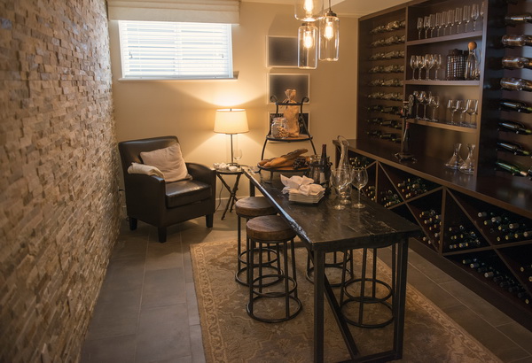 Room with dark dining furniture and wine filled shelves a nice wine cellar / elegant, luxurious / also full of wine